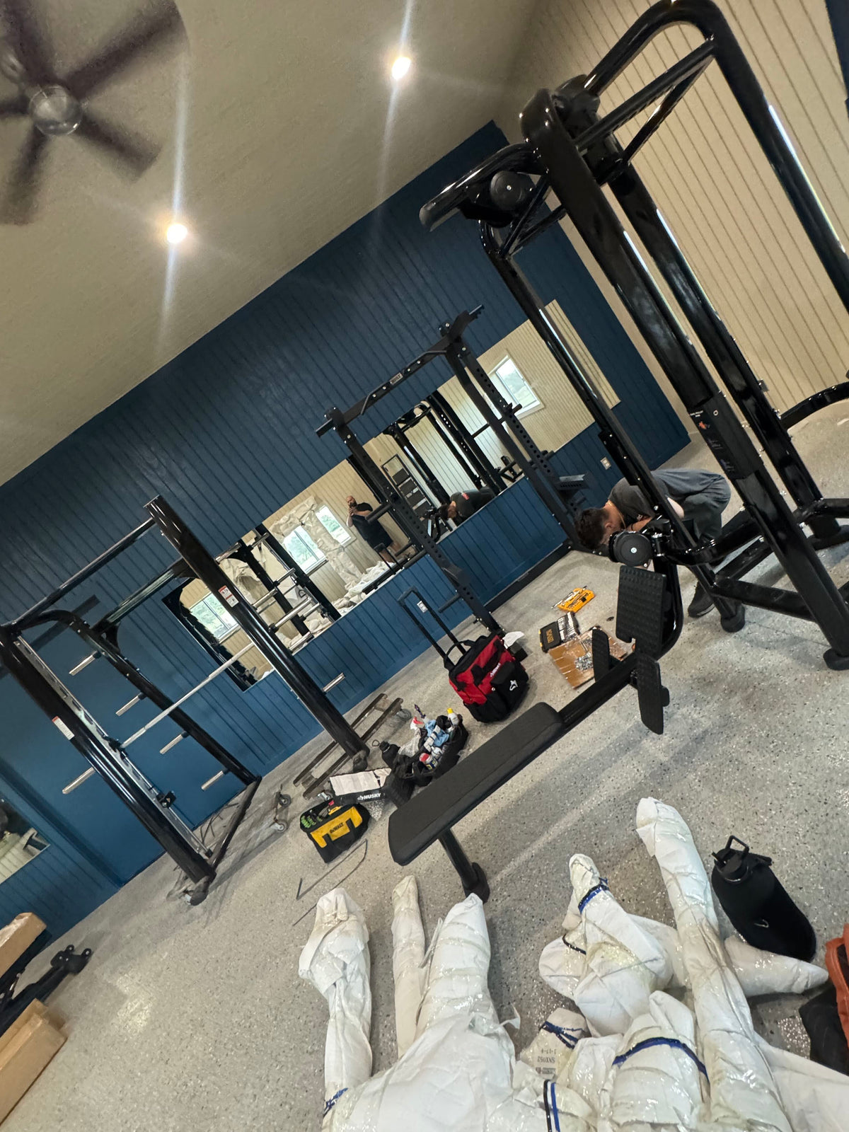Warehouse worker strapping a pallet